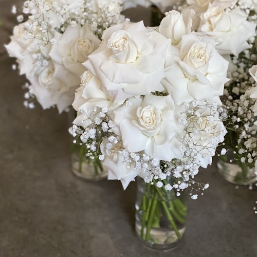 Bridesmaid Bouquet of  White Roses and Baby's Breath
